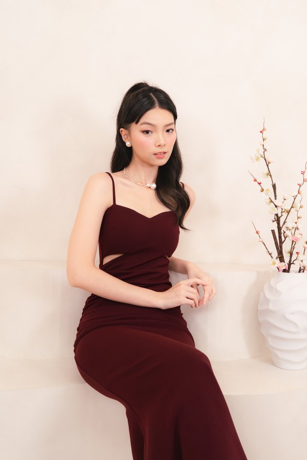 Corinne Padded Side Cut Out Ruched Midi Dress in Maroon