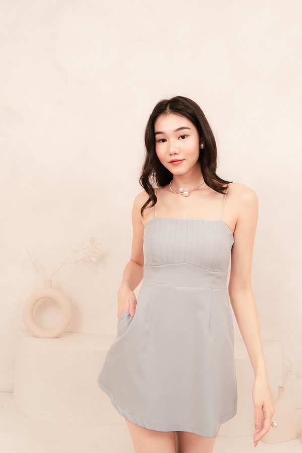 Edith Pleated Curve Hem Dress Romper in Baby Blue