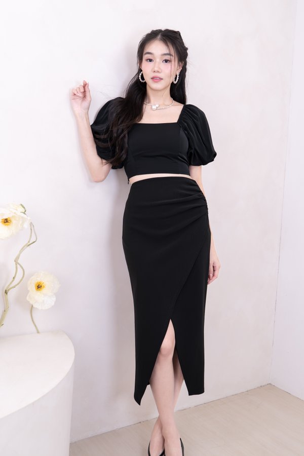 Clarice Overlap Front Slit Ruched Midi Skirt in Black