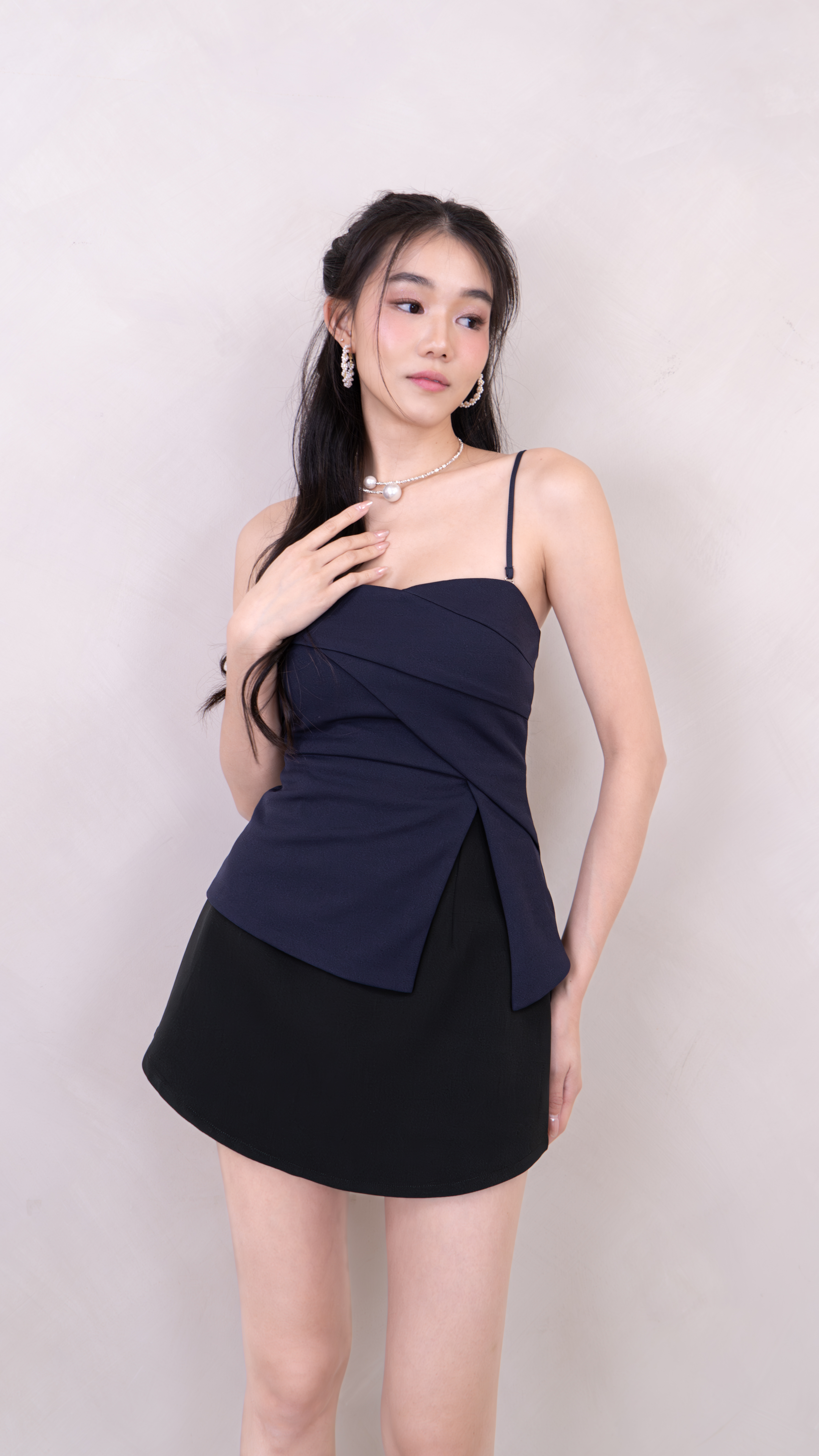 Imelda Padded Side Slit Peplum Top in Navy | Mikayla