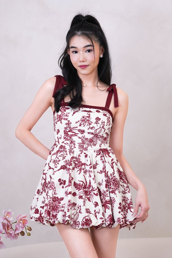 L575 Camryn Ribbon Strap Bubble Hem Dress Romper in Red Printed Floral