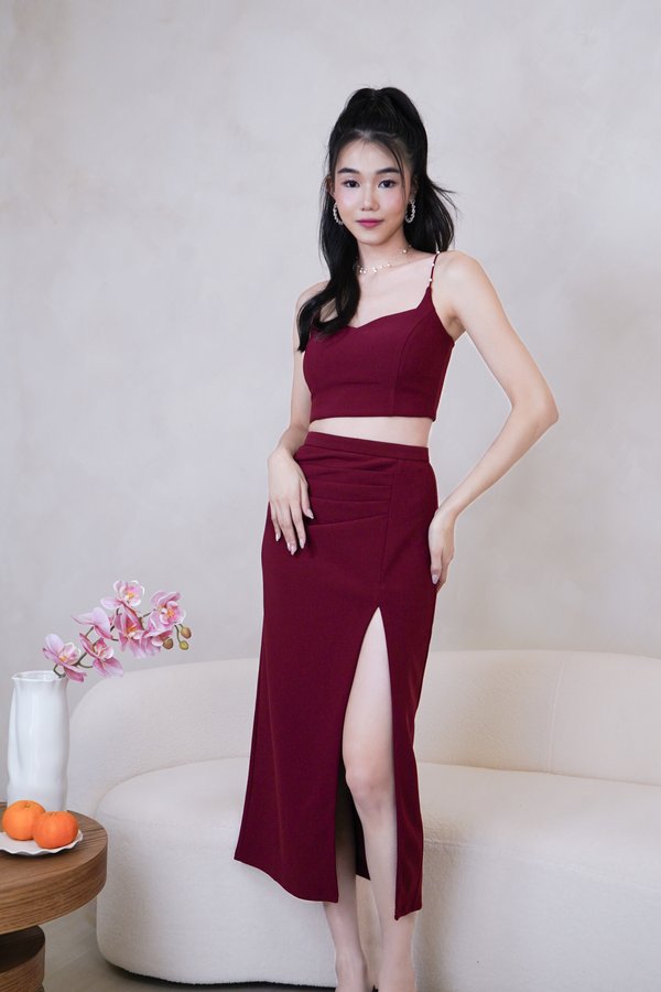 Dahlia Ruched Side Slit Midi Skirt in Maroon